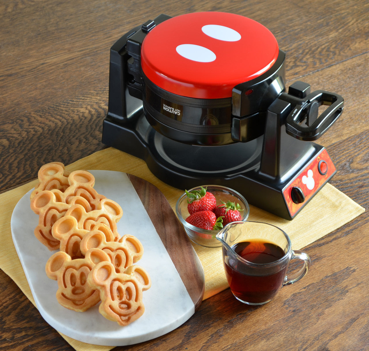 Disney Mickey Mouse Double Flip Waffle Maker with plated character waffles lifestyle image MIC-62 Select Brands