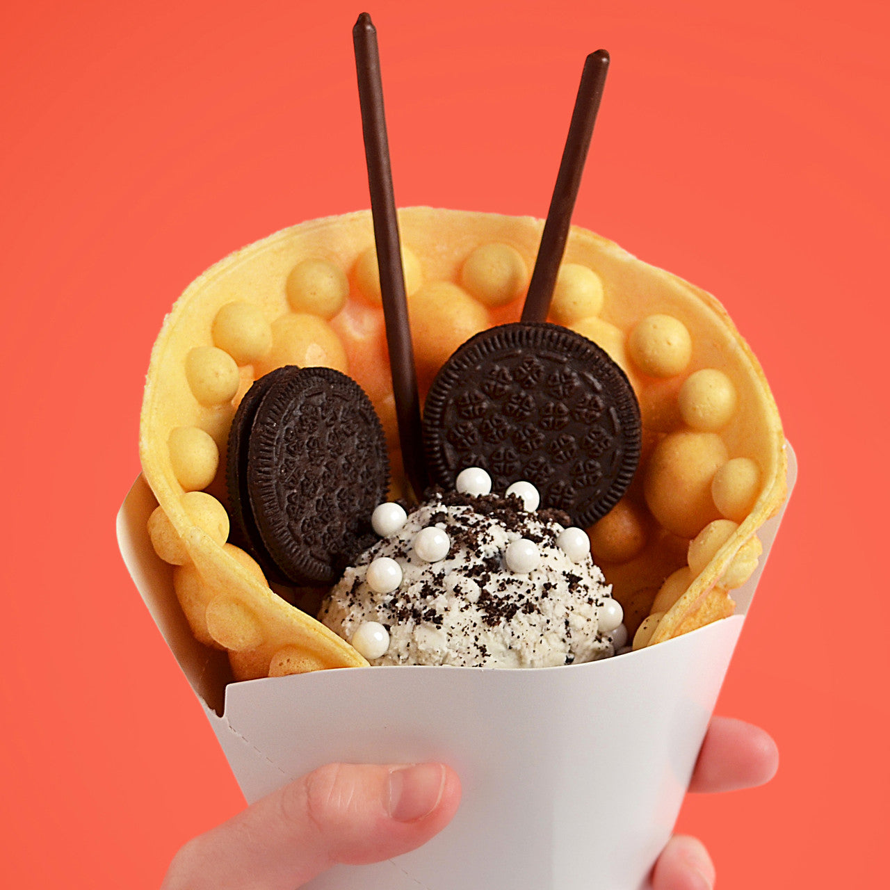 Disney Mickey Mouse Rotating Bubble Waffle Maker bubble waffle cone filled with hidden Mickey cookies and cream dessert MIC-66 Select Brands