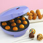 Babycakes cake pop maker lifestyle image with decorated cake pops on sticks CP-12 Select Brands