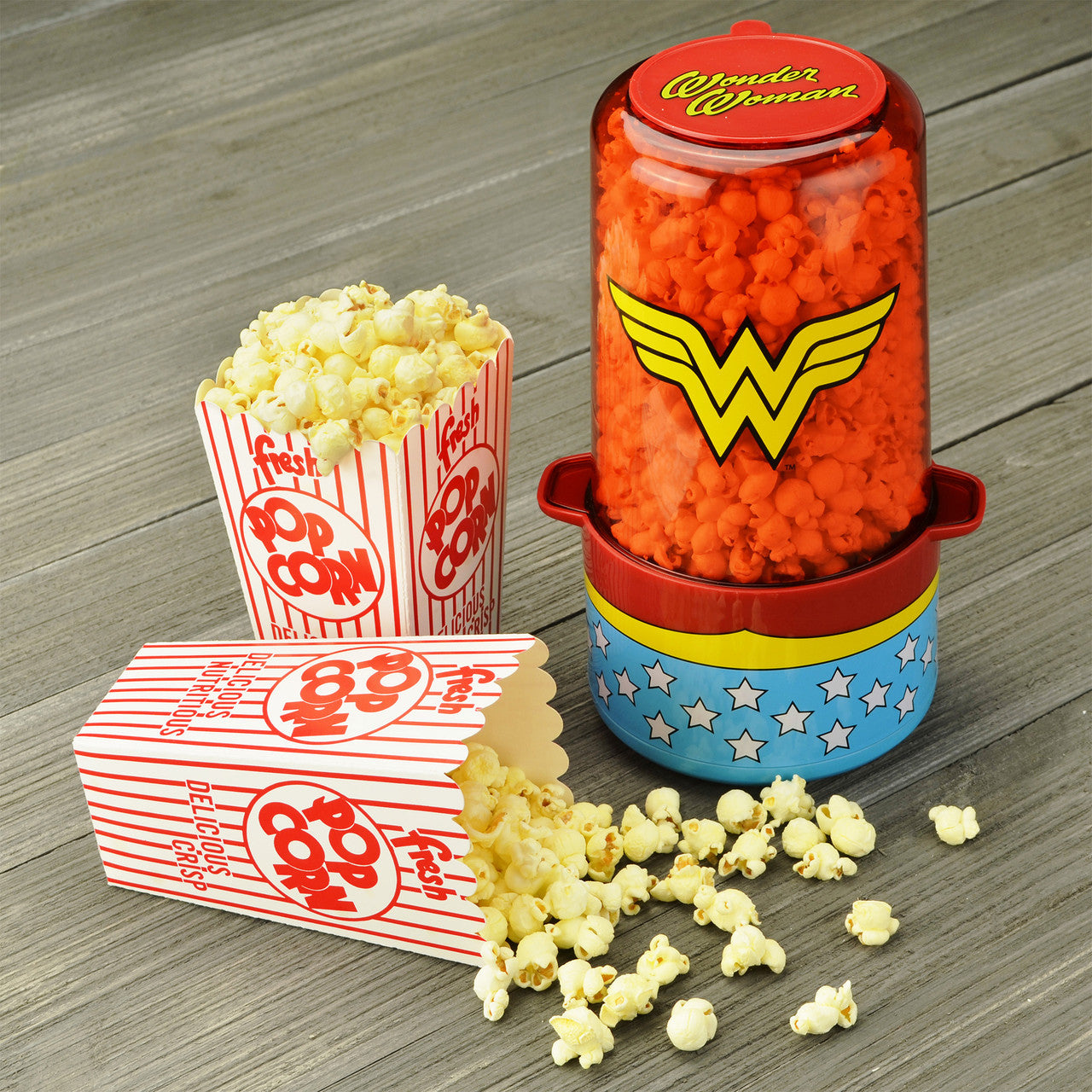 Wonder Woman Stir Popcorn Popper lifestyle photo with popcorn DCW-60CN Select Brands