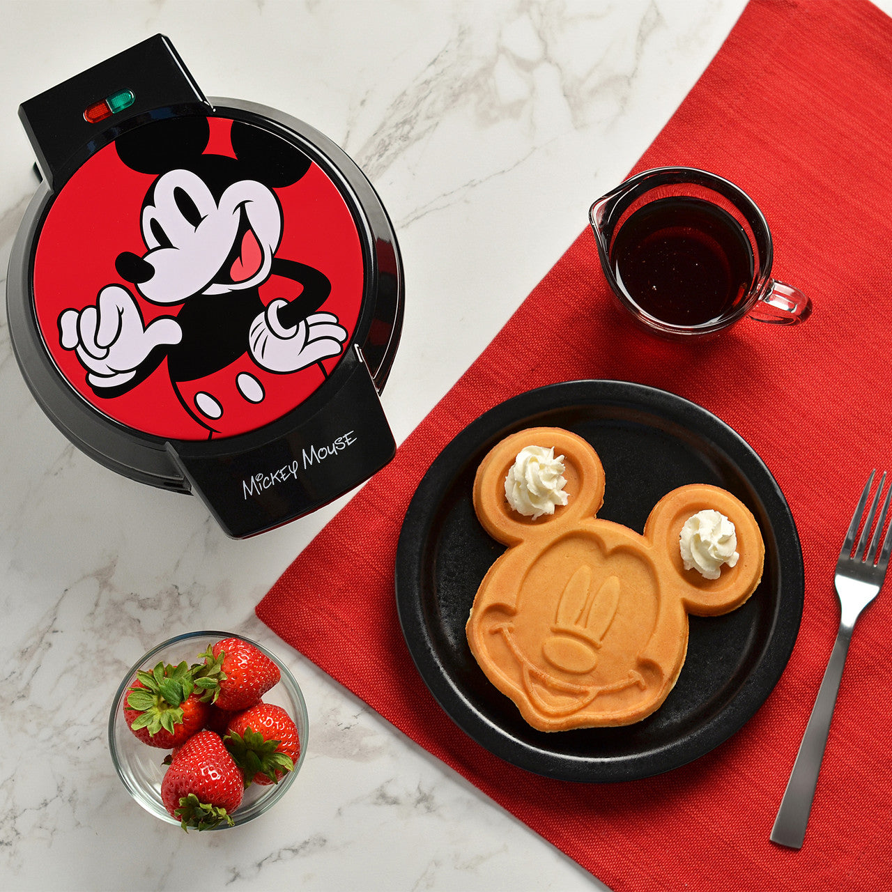 Disney Mickey Mouse Round Waffle Maker with Mickey waffle for breakfast in lifestyle photo MIC-2501 Select Brands