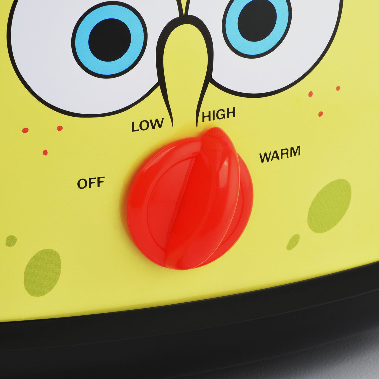 SpongeBob 7-Quart oval slow cooker yellow closeup of red heat control dial NKL-71 Select Brands