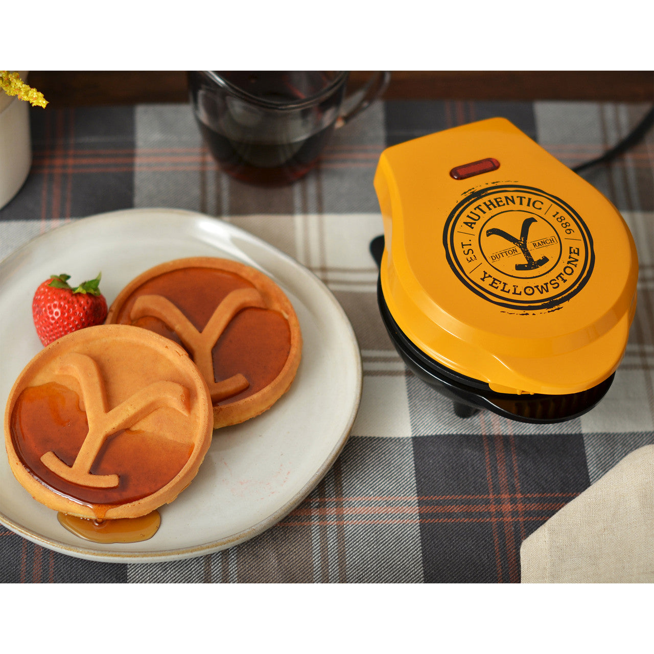 Yellowstone 4" mini waffle maker lifestyle image with waffles and syrup YS-46WM Select Brands